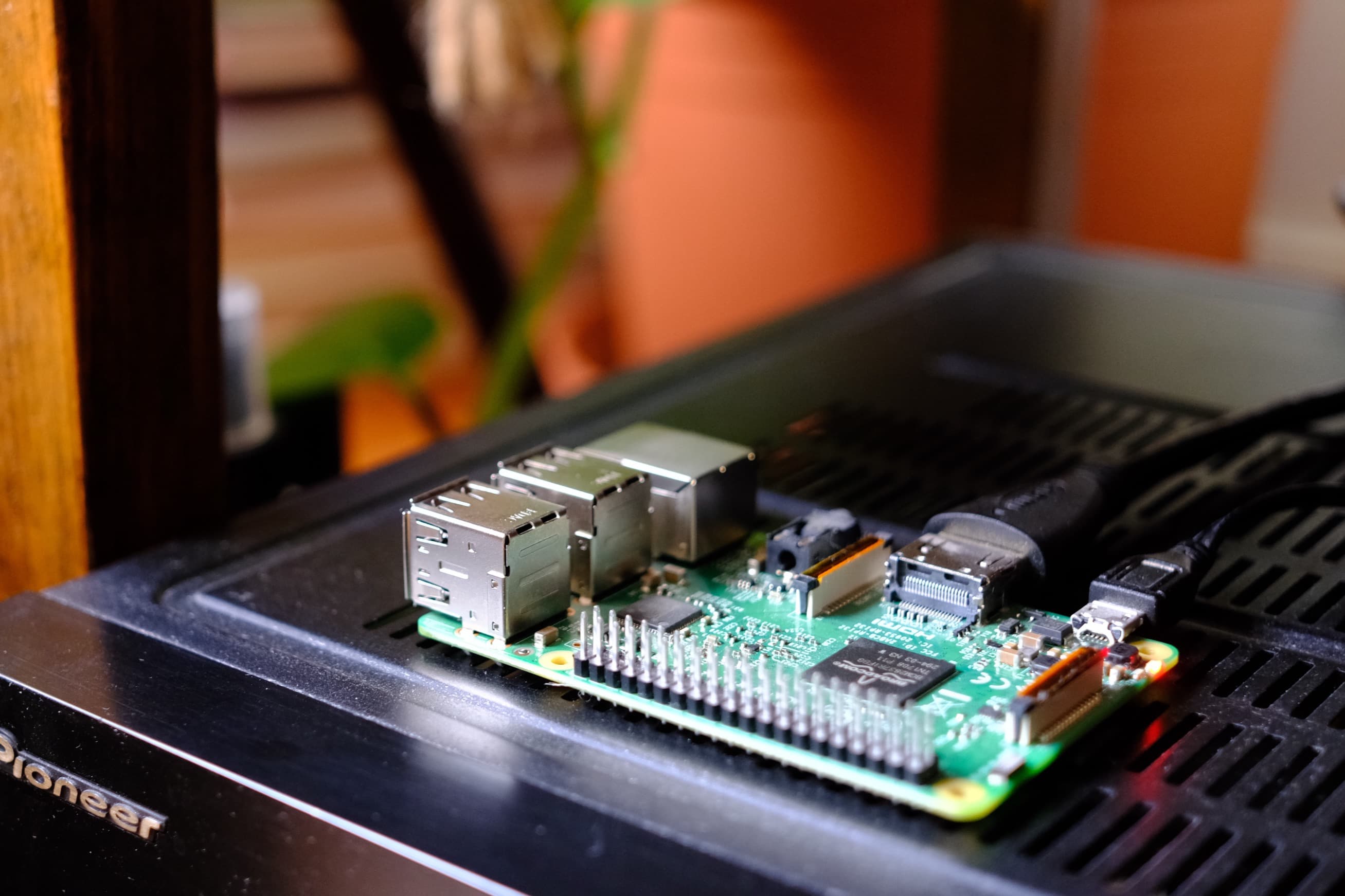 My bare metal Raspberry Pi on top of the receiver I use for AirPlay